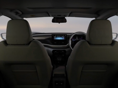 2025 टाटा अल्ट्रोज अपडेटेड इंटीरियर के साथ आएगी:फ्लश डोर हैंडल वाली भारत की पहली प्रीमियम हैचबैक, टीजर में दिखा इंटीरियर लुक