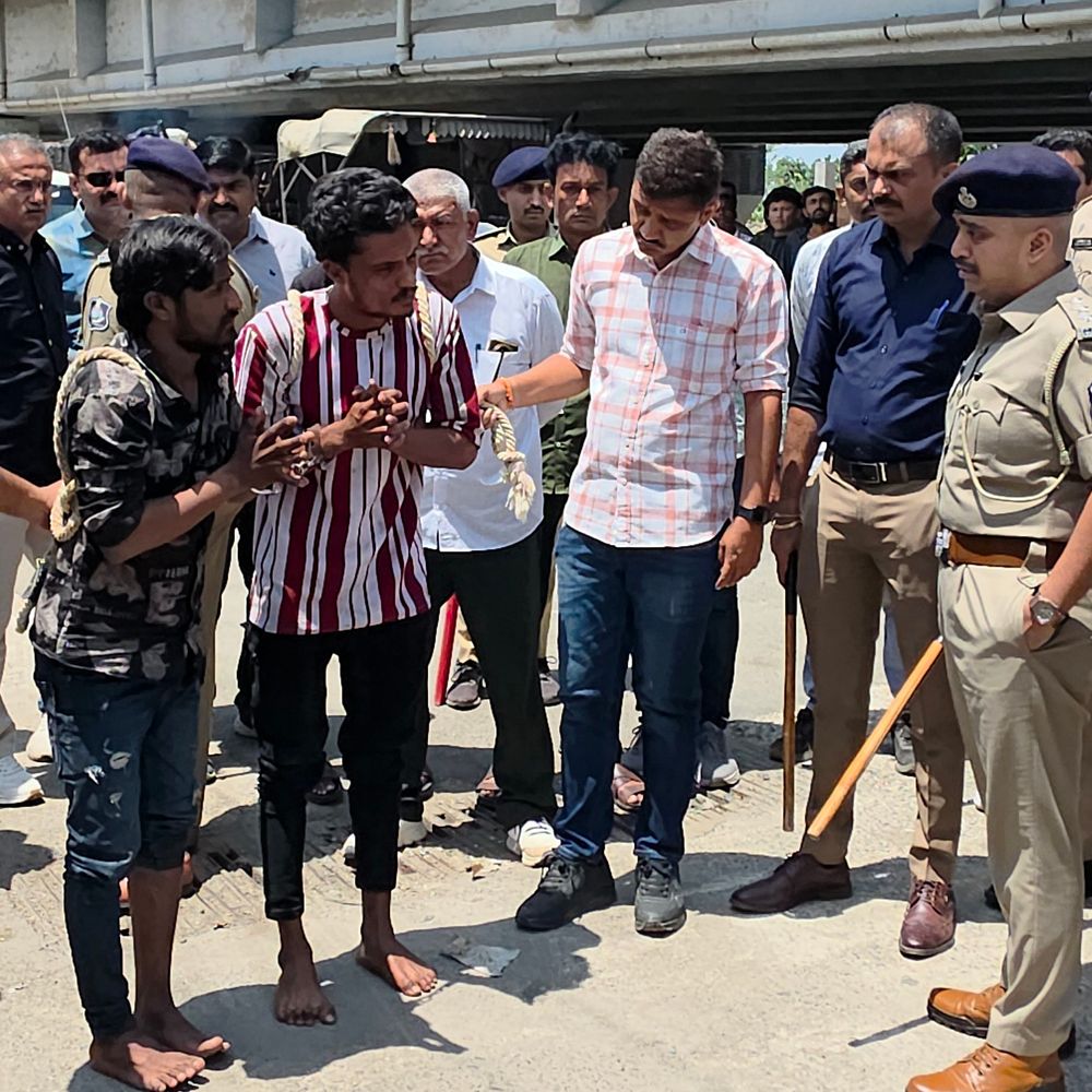 જામનગરમાં ધારિયા સાથે દાદાગીરી કરનાર બે શખ્સો જેલ હવાલે:દિગ્જામ સર્કલ પાસે પોલીસ સામે બબાલ કરી હતી