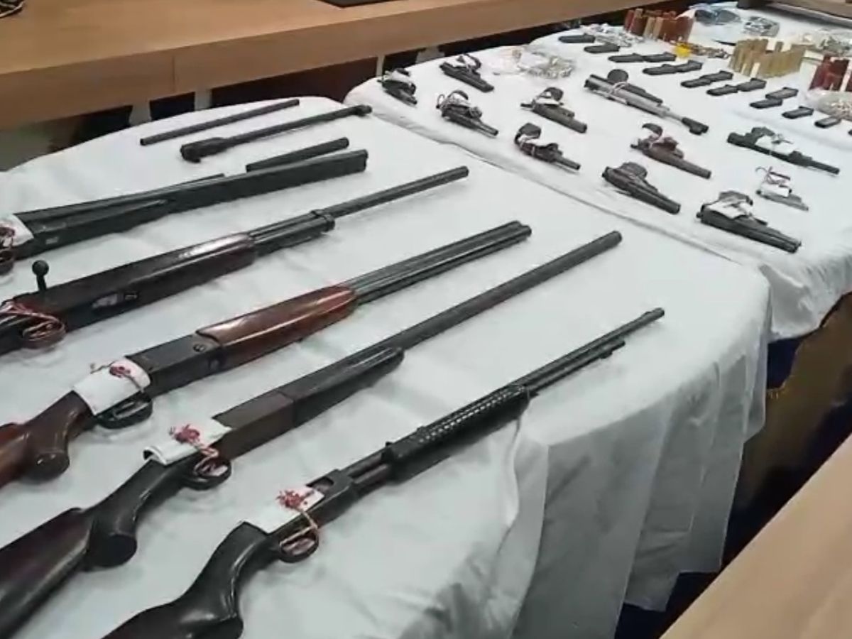 massive arms cache khardaha regent park flat 15 firearms seized 900 bullets  cash antique coins madhusudan arrested - West Bengal News | Bhaskar English