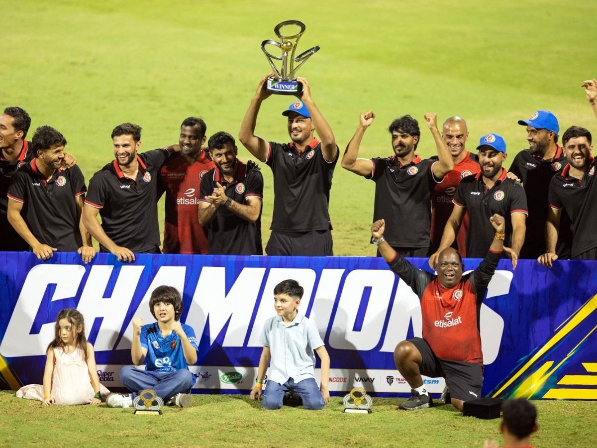 Afghanistan players lifting the ODI tri-series trophy