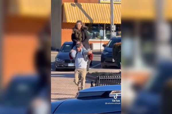 Was having fun with her friend outside the restaurant