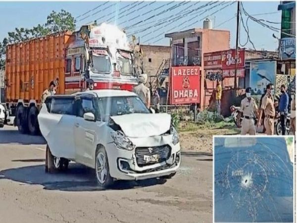 फायरिंग में क्षतिग्रस्त हुई कार। - Dainik Bhaskar