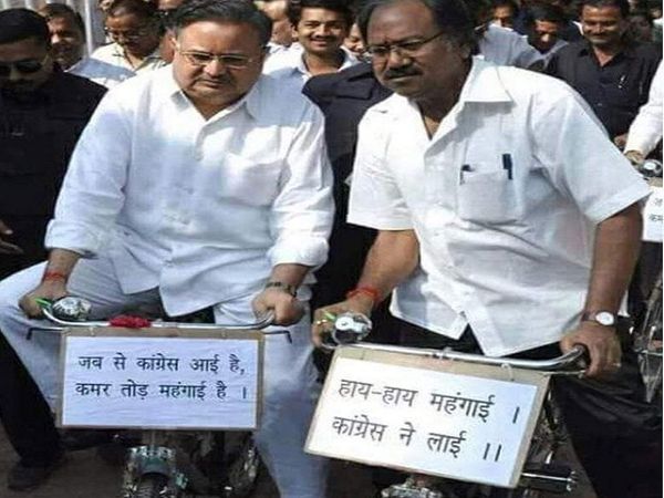 कांग्रेस डॉ रमन की यही तस्वीर वायरल कर महंगाई के मुद्दे के साथ उन्हें घेर रही है। - Dainik Bhaskar
