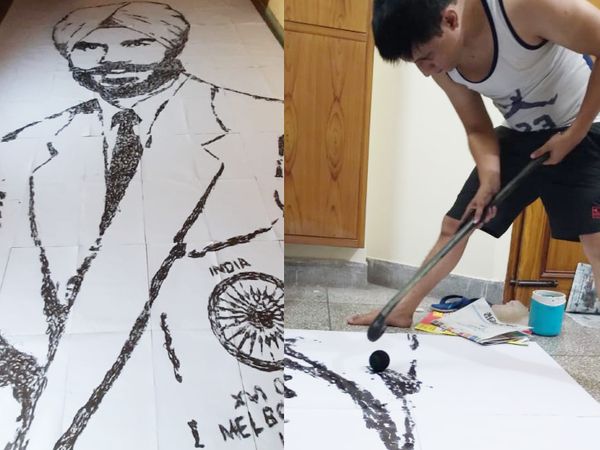 बलबीर सिंह सीनियर की तस्वीर और उसे बनाते वरुण टंडन (दाएं)।