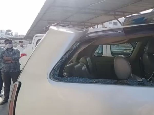 મહિલા કાર પર પટકાતા કારના કાચ તૂટી ગયા હતાં.