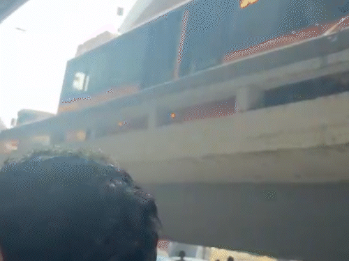 Surat BRTS bus crashes into flyover railing Passengers panic as bus ...