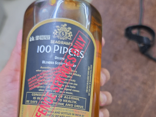 Fake liquor racket busted in Ahmedabad amid Bhavnagar tragedy: Cheap liquor mixed with chemicals & flavours, sold with expensive brand stickers; suspicious liquid and empty bottles seized - Ahmedabad News