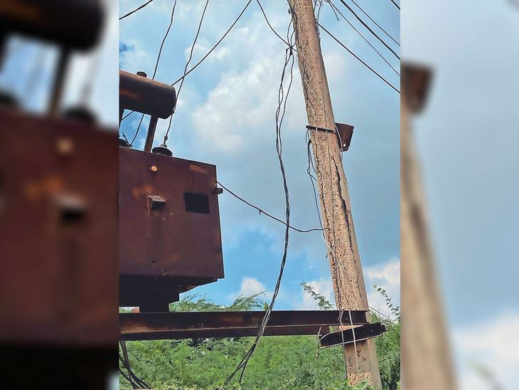 Transformer placed on dilapidated electric pole near police station ...