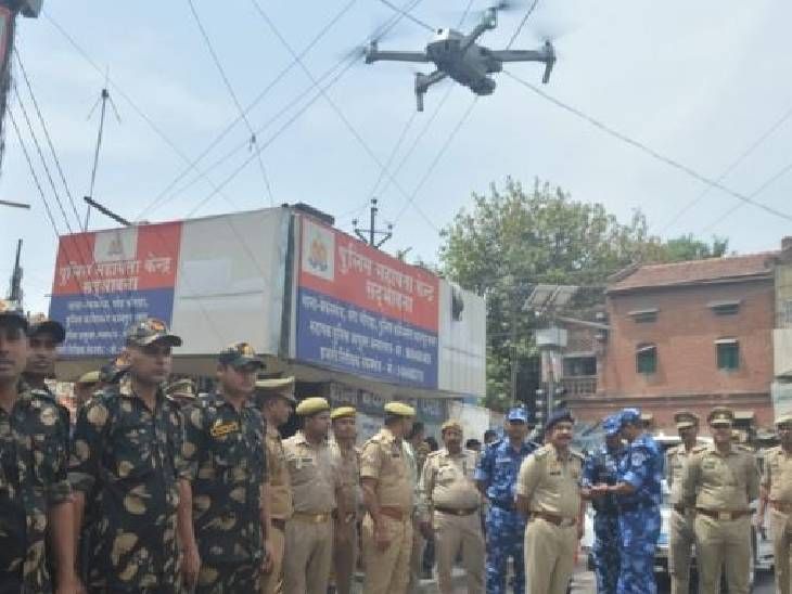 Police, PAC and RAF guard on the ground, surveillance from the sky with ...