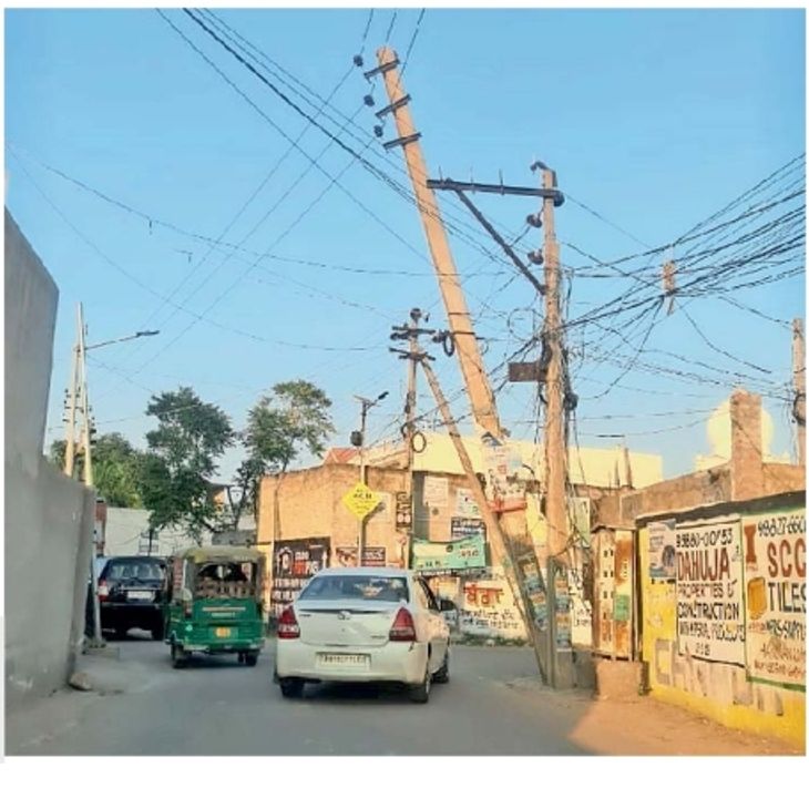 Electric poles bent on the road going from South City to Hambra, danger ...
