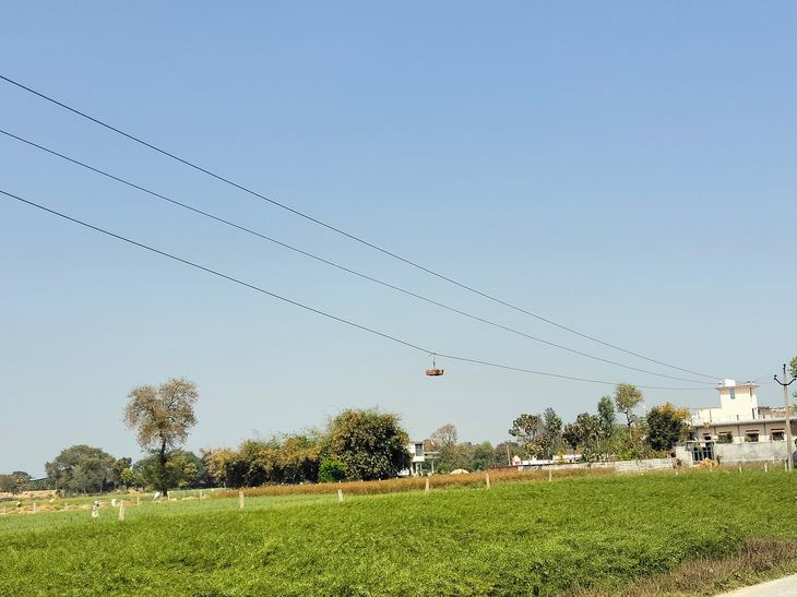 High tension wire seen hanging in the middle of the road in Chandauli ...