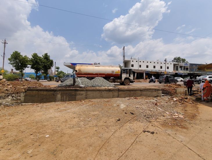 The main gate of the new bus stand is closed... Drain construction is ...
