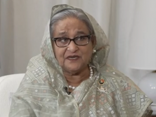 Bangladesh Protest Violence Update; Dhaka Hindu Attacks | Mohammad Yunus | दावा-हसीना बोलीं- बांग्लादेशियों की जान बचाने के लिए इस्तीफा दिया: कहा- अमेरिका को सेंट मार्टिन द्वीप दे देती तो सत्ता नहीं जाती, मैं बांग्लादेश लौटूंगी