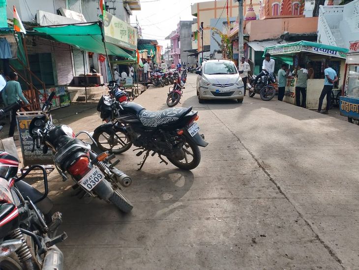 Chaos. Traffic is getting obstructed everyday due to vehicles parked on