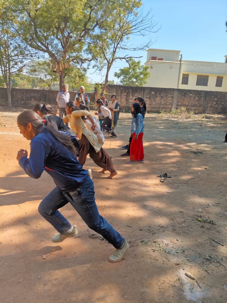 100 meter race and cricket ball throw competition of girl students was ...