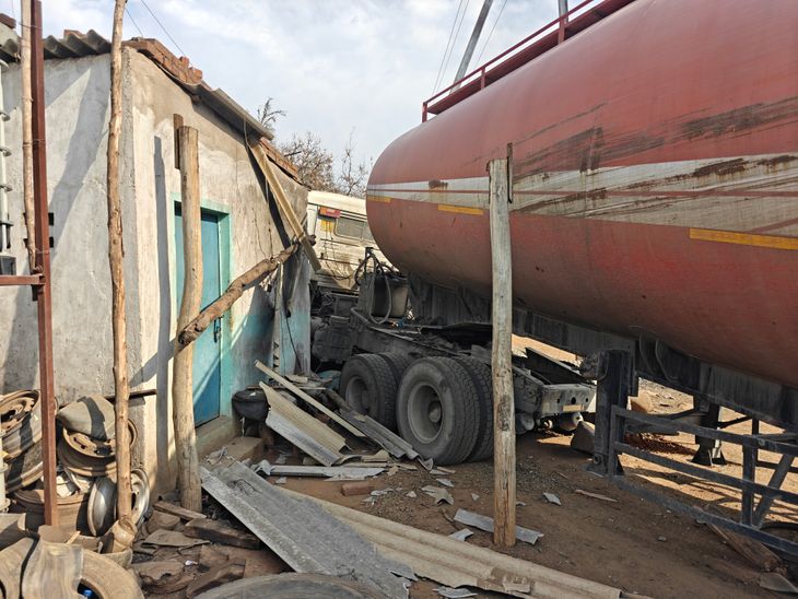 The truck entered the tyre shop after hitting the Bolero