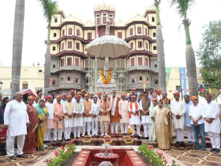 Rajwada Palace, Indore, illuminated at night.  Image shows intricate cabinet decor inside the historic building.  Night opening.