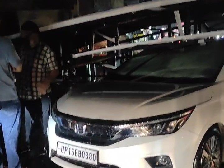 Storm and rain wreak havoc in Meerut Unipole fell on school operator car