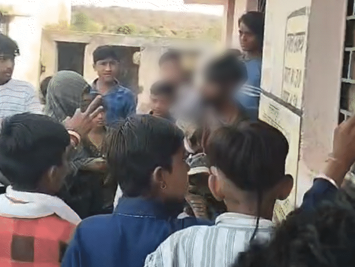 Image shows the aftermath of an incident where Dalit youths in Rajgarh, Madhya Pradesh, were subjected to humiliation.  Demand for justice.