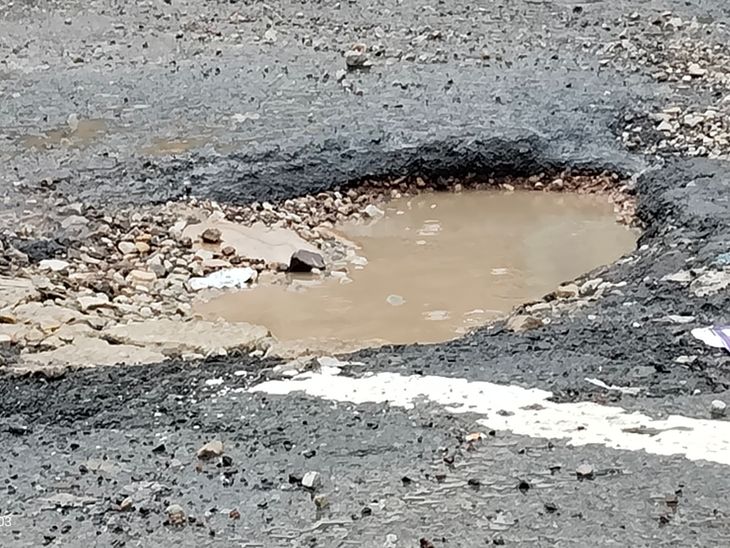 The dilapidated road of NH-30 has become dangerous