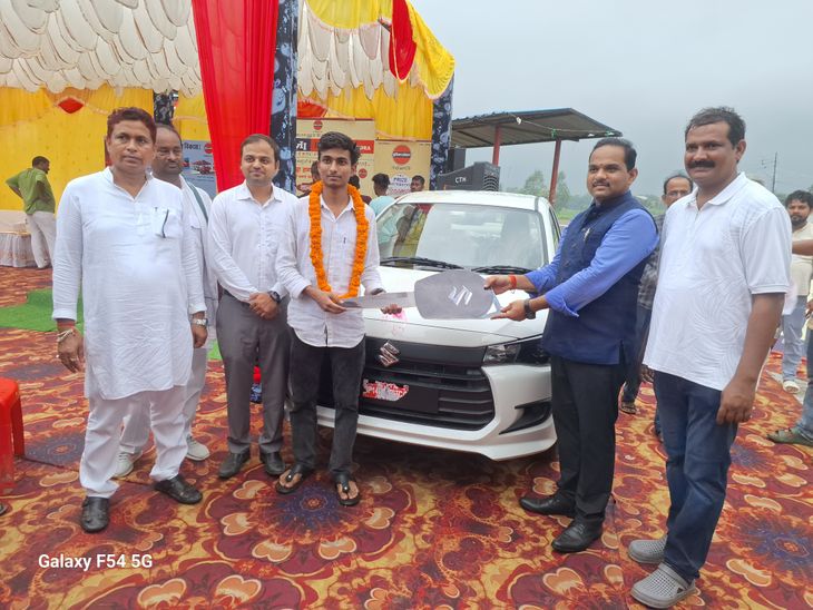 Atif wins designer car in lucky draw