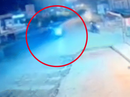 Scooty rider flies into the air after being hit by a car – video