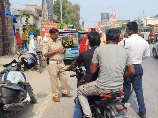 Action taken against people without helmet, triple riding and stunting ...