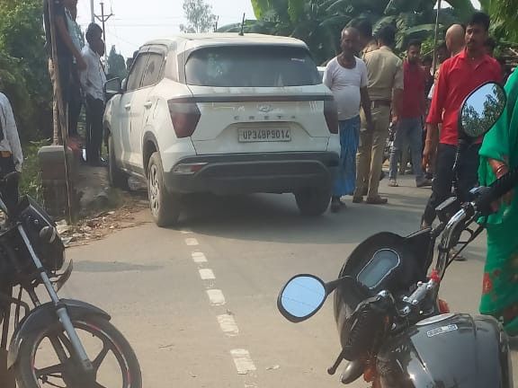 Bike rider dies after being hit by a car