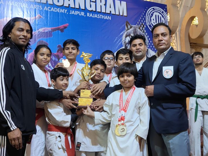 Didwana players hoist their flag in Karate Mahasangram 2025 | कराटे ...