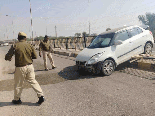 Car overturns on National Highway 11, hits railing