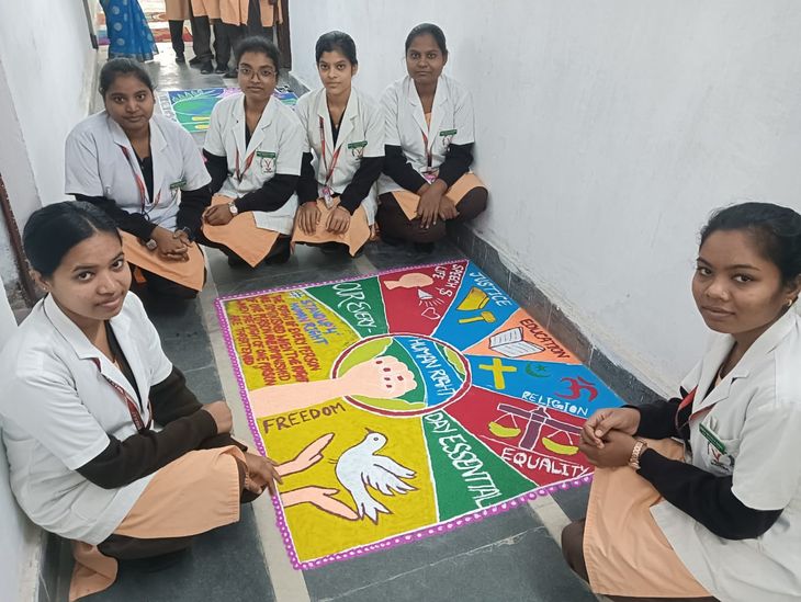 The girl students created Rangoli and depicted the spirit of human rights.
