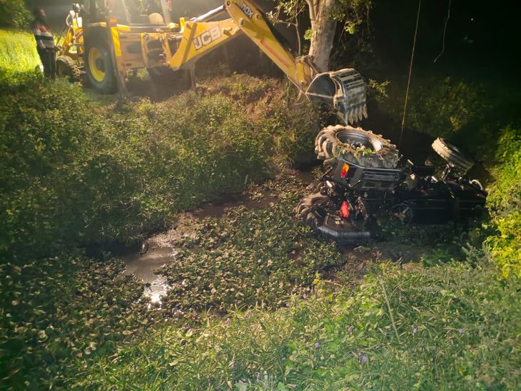 Tractor overturns in front of police station, youth dies