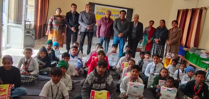 Uniforms distributed to children at Goodwill High School