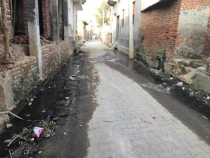 Mud in the streets of Mundali village in Meerut