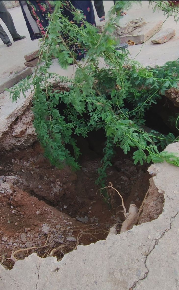 Road caved in near sewerage chamber, 10 feet deep pit