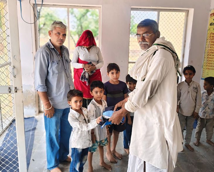 Dresses and materials were distributed to 15 children in the school.