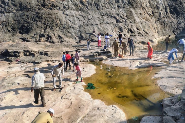 Water purification in Chandeshwari Ghat and Devi Temple area, cleaning ...