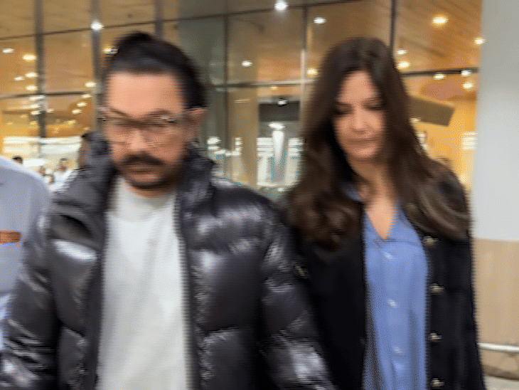 गर्लफ्रेंड गौरी स्प्रॅटसोबत मुंबईत परतला आमिर खान:  हातात हात घालून विमानतळावरून बाहेर पडले; कृती सेनन, मौनी रॉय देखील दिसल्या