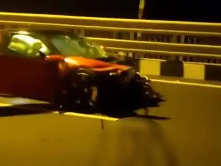 A Ferrari car smashed into a railing on the Worli-Bandra Sealink ...