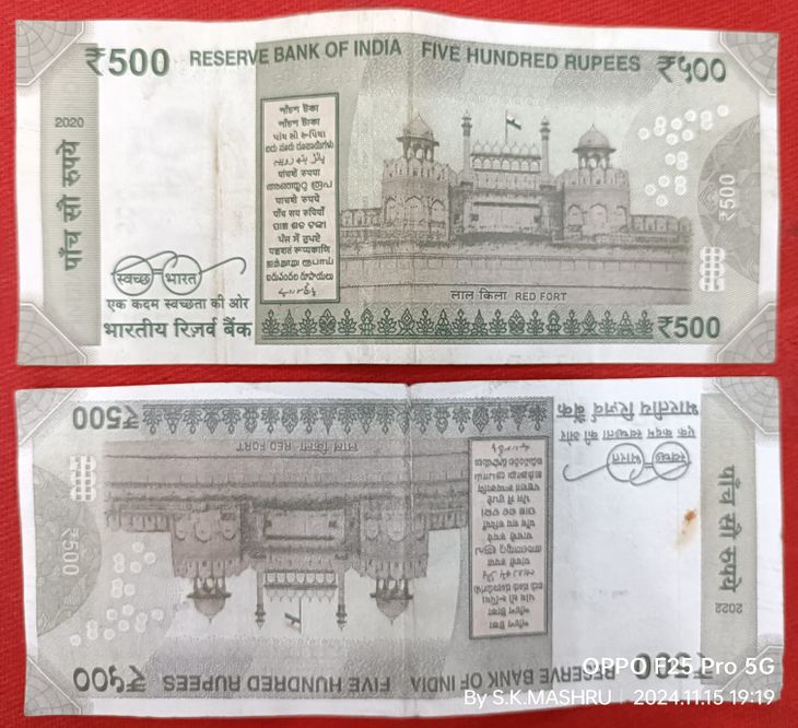 500 fake note with upside down picture, caution required
