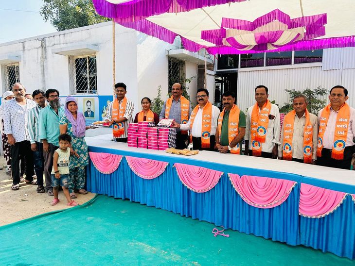 Distribution of sweets and snacks to 2000 families in Kadi