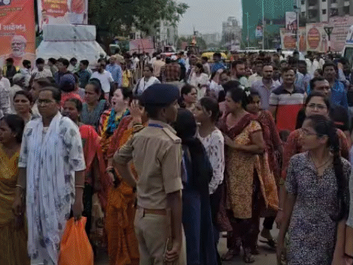 Huge crowd gathers at PM Modi's road show and rally Supporters wave flag  terming Prime Ministers as their idol - Ahmedabad News | Bhaskar English