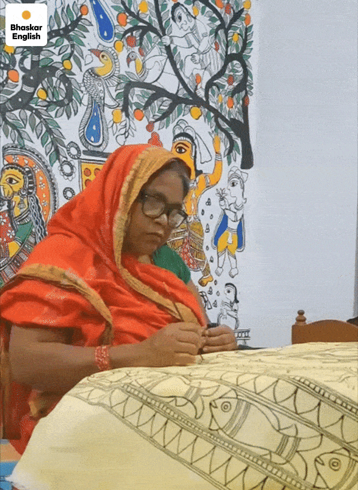 Dulari Devi creating the world-famous Madhubani painting at her home. After her daughter's passing, she made painting her life.