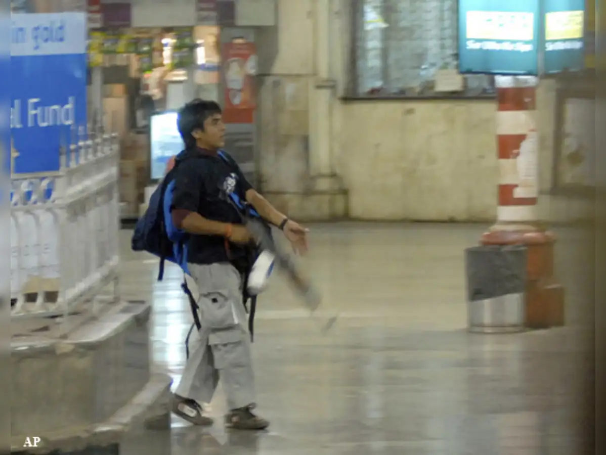 Ajmal Kasab, the only terrorist gunman caught alive in the 26/11 Mumbai attack, carrying an AK-47.