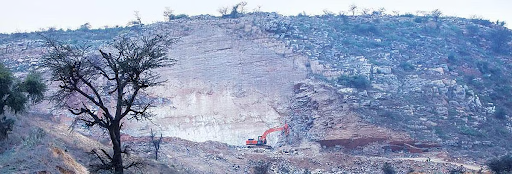 Vertical urban redevelopment and reuse of defunct industrial land in NCR could also have reduced pressure on natural hills.