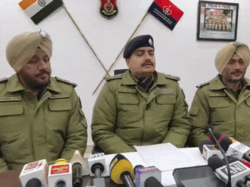 Sangrur SSP Sartaj Chahal briefing the media during a press conference on the murder mystery.