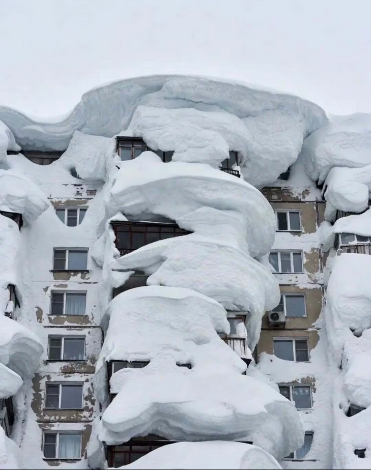 Images of Kamchatka’s snow-buried cities go viral, showing high-rise buildings submerged, highlighting severity of storm and vulnerability to extreme climate events(Image: Instagram)