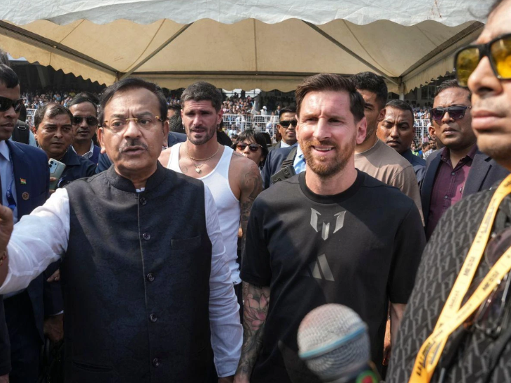 Former West Bengal Sports Minister Aroop Biswas with football legend Lionel Messi alongside organiser Shatadru Dutta during the Kolkata event.