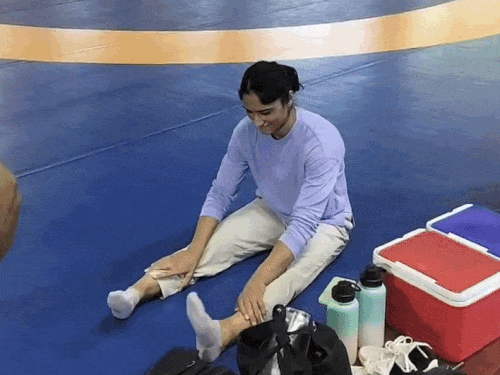 Following this, Vinesh performed leg warm-up exercises right there on the mat.