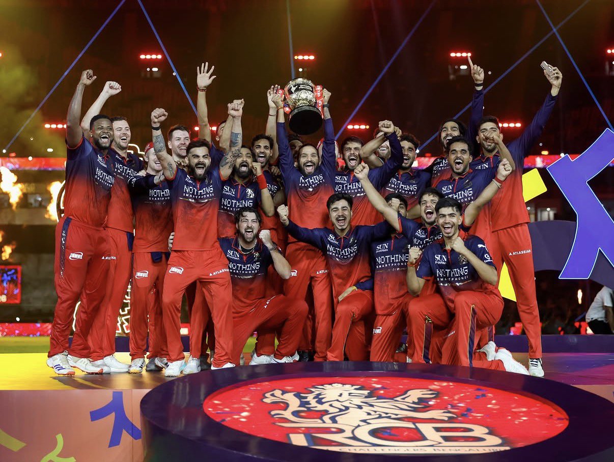 RCB with the IPL 2026 trophy. (Photo Credit: PTI)